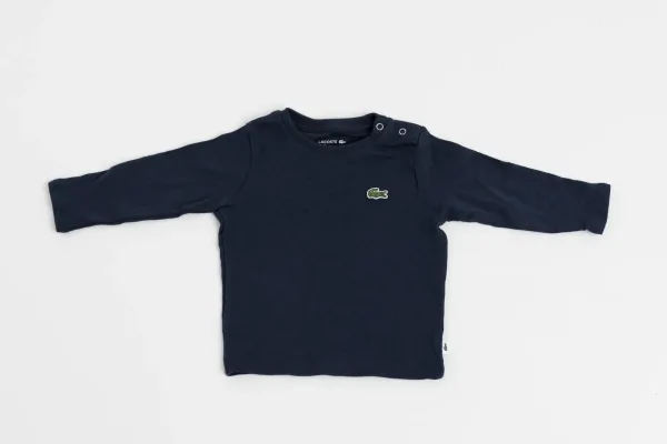 Lacoste · VESTIMENTA — Camiseta Lacoste bebé nueva col… (SUB26-VES-013-001) — imagen 1